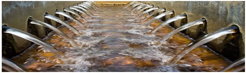 Figure 3:Water flowing into a drainage systemSource: https://infrastructurenews.co.za/2020/10/05/black-water-to-potable-water-treatment-and-purification/ 